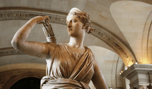 Female statue tan cream stone